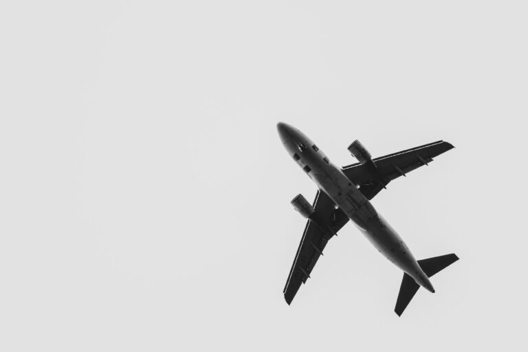 An airplane leaving, representing an international relocation or assignment return.